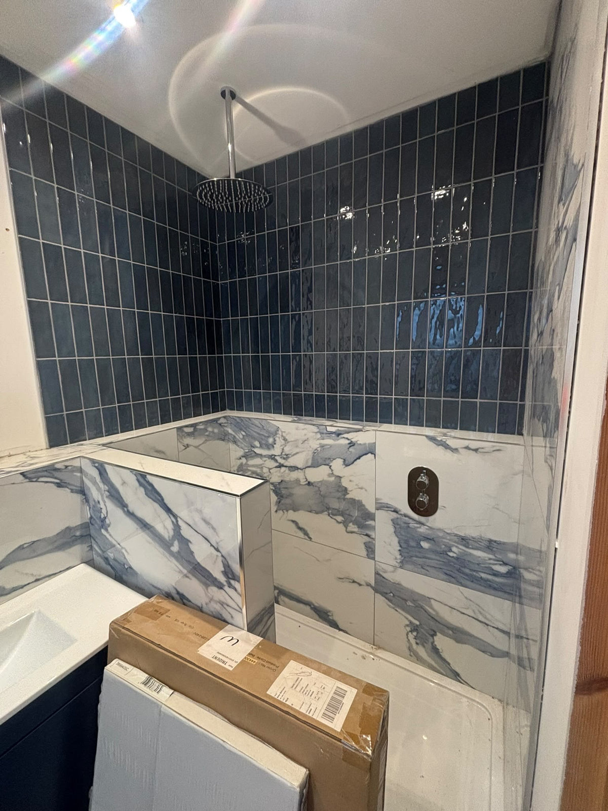 Precision tiling and high-quality bathroom surface preparation
