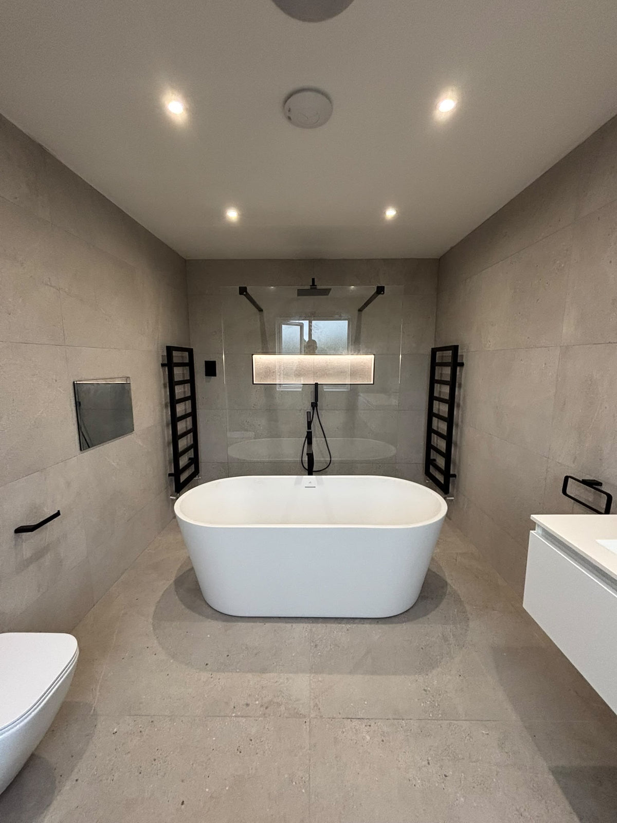Bespoke bathroom tiling in ceramic, porcelain or natural stone