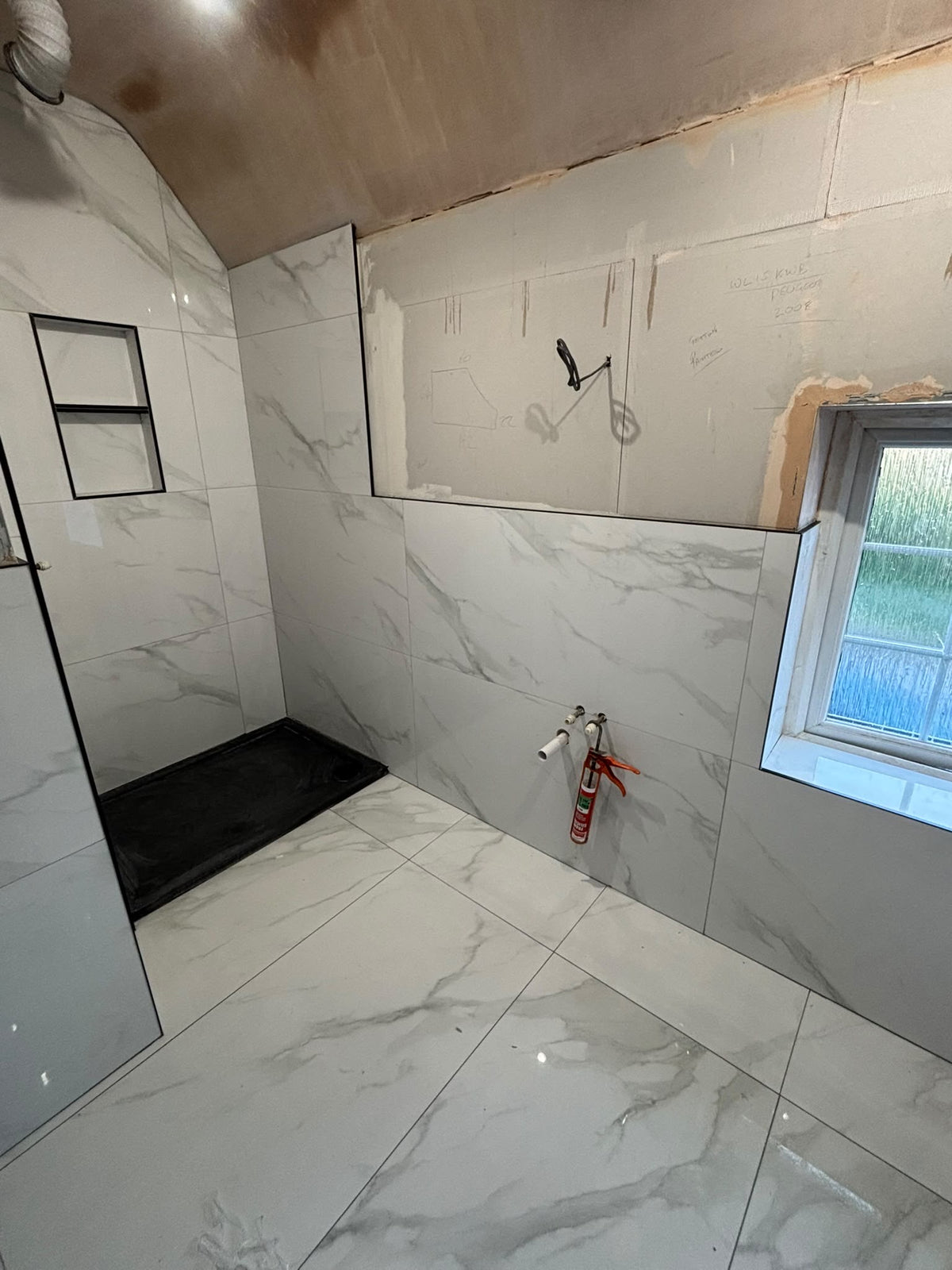 Marble granite and travertine natural stone tiles in a refined interior