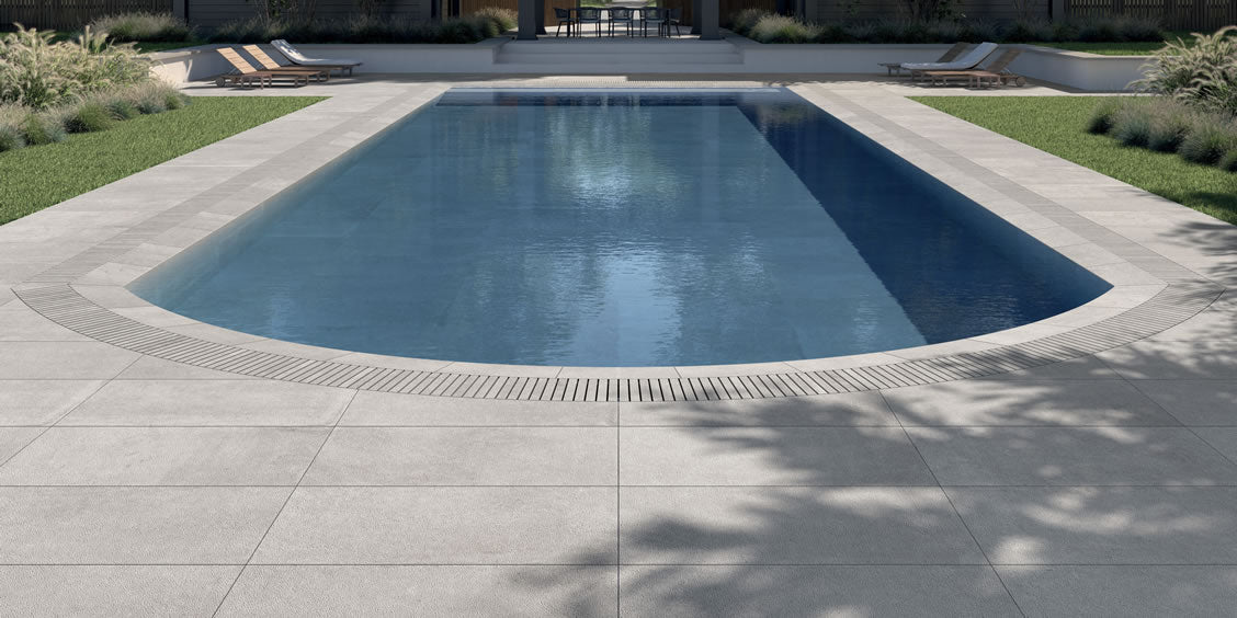Specialist tiling around a completed indoor swimming pool